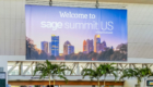 Welcome to the Sage Summit banner outdoors